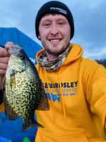 Brady Laudon displays a Minnesota crappie taken below the ice. He says catching fish comes down to a good presentation. (Contributed Photo)