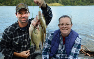 Fisheries Biologist Chris McKee and his wife, Kasie, will fish for an hour or two in the winter and bring home a mess of crappie slabs, since they know where the crappie must be holding. (Photo: John E. Phillips)
