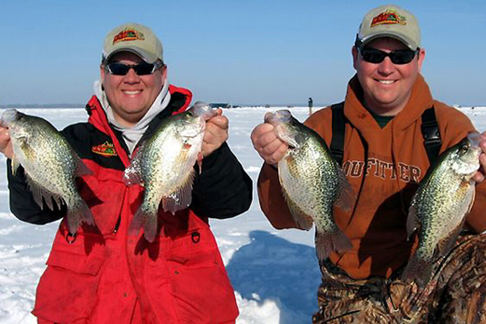 Chris Hanson (left) and Darren Troseth show off their black crappie catch from Upper Red Lake in 2007.
