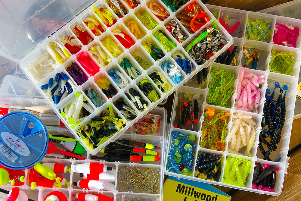 The ideal tackle box or bag includes storage space for all the lures, hooks, bobbers, sinkers and other fishing paraphernalia an angler might need during a day on the water.