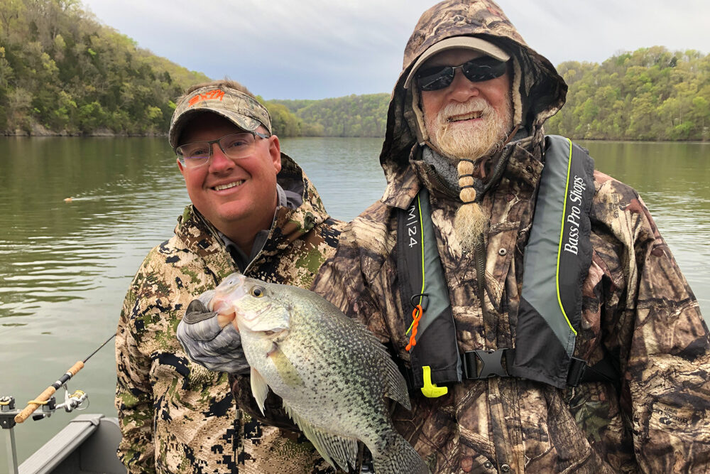 Guide Corey Thomas (left) says using planer boards has dramatically improved his crappie trolling success, especially in the clear waters of Dale Hollow Lake.