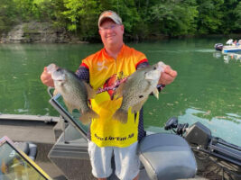 Corey Thomas says he uses planer boards to strategically intercept spooked fish moving away from the boat.