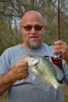 Mark Sulser with a nice white crappie caught in a creek. (Photo: Richard Hines)