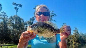 Happy wife, happy life! Dee Dee Bates is all smiles with this sac-a-lait caught in Bayou Lacombe. (Photo: Keith Lusher)