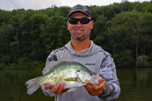 Gus Glasgow with a nice crappie sniped with a feather jig during a LiveScope demonstration on Lake Arthur.
