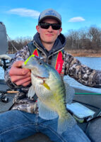 Alex Palmer, 17, uses his homemade jigs to catch big crappies on Truman Lake.