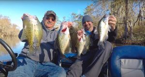 Tim Bye (left) and Keith Lusher show off a few Bayou Lacombe sac-a-lait all caught after Noon following an early morning bite that yielded nothing.