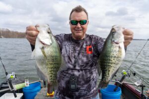James Callaway, a.k.a., The Crappie Ninja, with a handful of crappie caught on crankbaits at Lake Washington in Mississippi. (Photo: Brad Wiegmann)