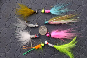 A sampling of hand-tied crappie jigs demonstrates how the various tying materials can be used to create custom jigs. Not all turned out perfect – but all will catch crappies. 