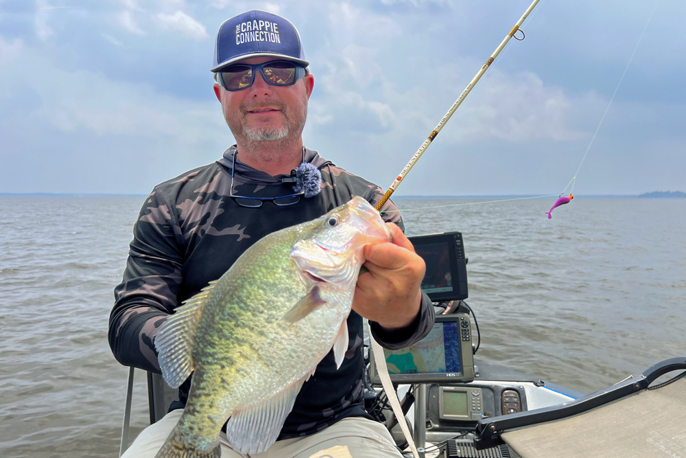 Crappie guide Brad Chappell shows of a Barnett Reservoir slab. Overall, he says “The Rez” might produce smaller crappie than the trophies found in Grenada and Sardis to the north, but it makes up for it in numbers. (Photo: Richard Simms)