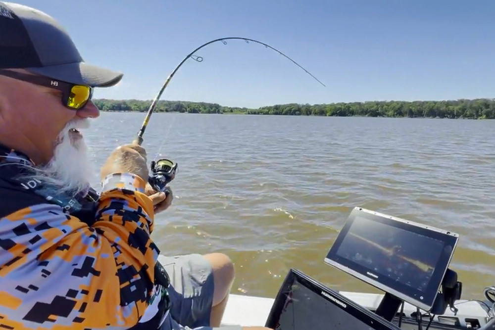 Duck Dynasty star and B’m’M Prostaffer John Godwin is proud of a new crappie rod he helped develop – the Godwin Crappie Caster - to be released this Fall. (Photo: Richard Simms)