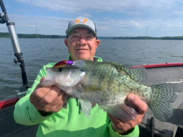 Fishing with guide, Capt. Scott Lillie, Dickey Porter shows off a fine white crappie taken trolling crankbaits on the Tennessee River. Capt. Lillie said the Boogie Shad 5 is his ‘go-to’ lure for summertime crappie fishing. (Photo: Scott Capt. Lillie)