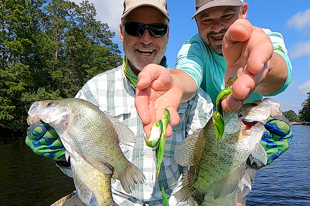 John Guillot and Keith Lusher celebrate after a successful trip using green shiners.