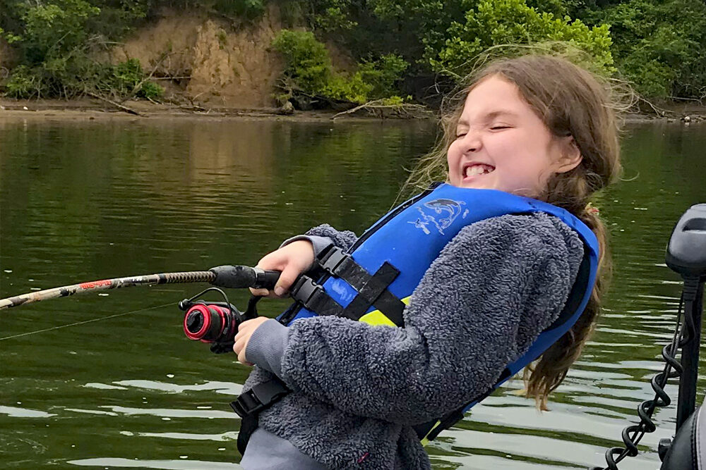 No matter what species they’re fishing for, nothing beats the joy of introducing a youngster to fishing. As often as not, the teacher gets as mush joy as the student. (Photo: Richard Simms)