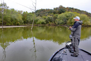 Working a cork-and-jig combo through shallow stumps and standing timber, Ohio tournament pro watches intently for a strike. (Photo: Greg McCain)