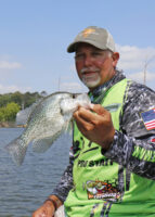 John Harrison shows off a crappie he first spotted on live imaging sonar on a tough day of fishing at an oxbow lake off the Alabama River. (Photo: Tim Huffman)