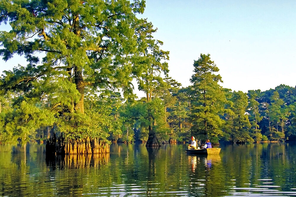 A backcountry cypress lake provides a beautiful setting for a fishing trip where one can ponder the mysteries of the natural world. (Photo: Keith Sutton)