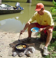 Sometimes the best meals feature food we caught ourselves, prepared by the lake or stream where we caught it. (Photo: Keith Sutton)