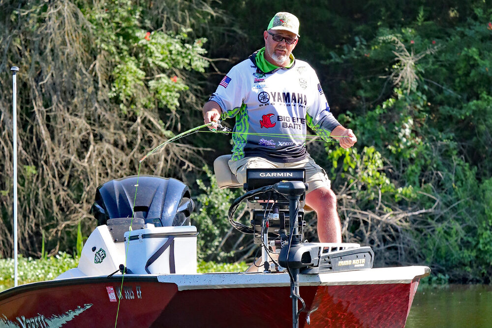 Crappie Cowboy Craig Nichols likes to pitch a jig. He controls it with his pole tip and pulling line with his hand. He can slowly swim it back, control the depth, and control the action. (Photo: Tim Huffman)