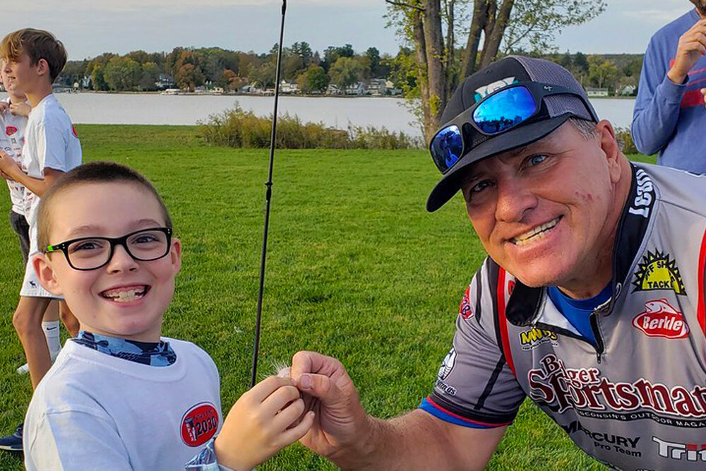 Capt. Greg Karch with one of the obviously happy participants of this year’s Learn 2 Fish With Us clinics. (Contributed Photo)