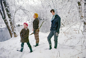 Christmas photo of family in snow hunting