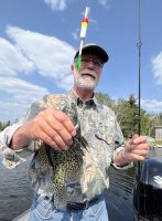 Tom Peterson is an all-species fisherman. He likes Al’s Goldfish rigged over a minnow because the flash attracts crappie while the minnow on a leader from the Goldfish catches the fish. It’s good for all species. (Photo: Tim Huffman)