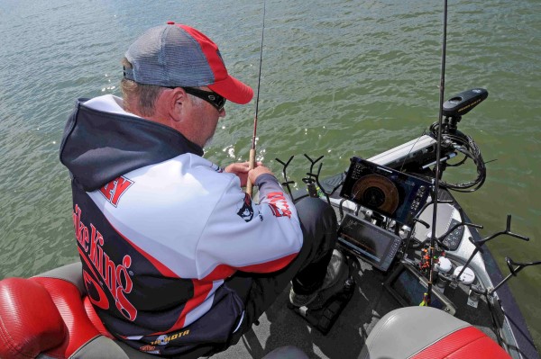 His array of electronics on the front deck of his boat gives Tim Blackley a big advantage when vertical jigging for crappie holding tight to cover.