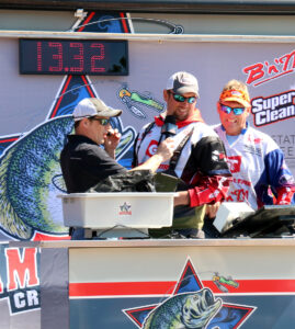 Running a weigh-in is not easy but James Bryant says he enjoys seeing the fishermen, their weights and reactions.