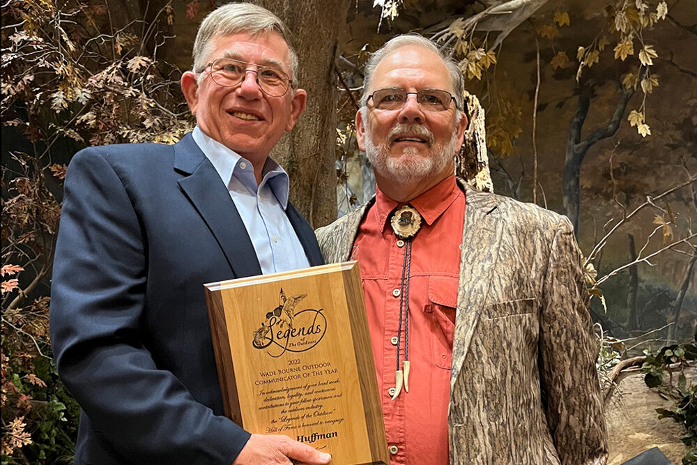 CrappieNOW Senior Writer, Tim Huffman (left), pictured with Garry Mason, founder of the Legends of the Outdoors organization after being presented the prestigious, Wade Bourne Communicator of the Year award.