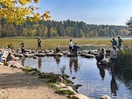 Visitors wade in the waters of the Mighty Mississippi River where it isn’t very mighty. This exact spot, in Itasca State Park, is the very beginning of the great river. A drop of rain that falls here will take 90 days to reach the Gulf of Mexico. (Photo: Richard Simms)