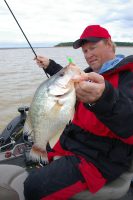 In winter, slow and steady are tickets for success with Grenada Lake giants. Visiting South Carolina angler Whitey Outlaw displays one of the slabs typical of the crappie caught here in January.