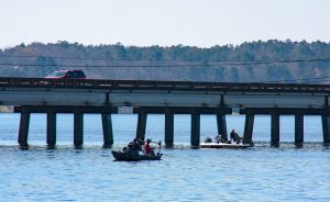 Bridges with concrete pilings are potentially good structures any time of the year. A good tip is to fish the down-current side of bridges. Crappie may be in the current breaks just behind the pilings or they can locate along channel drops on the down-current side several boat lengths from the bridge. 