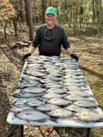 Caption: Captain Doug Nelms showcases a nice mess of big Lake Oconee black crappie. (Photo courtesy of Capt. Doug Nelms)