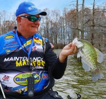 “Crappie Dan” cast to catch a post-spawn crappie from cypress stumps next to open water. Tackle included a B’n’M 7.5-foot Anniversary Edition spinning rod and a Road Runner jig with a Bobby Garland Stroll’R body.