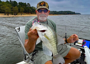Mississippi power troller Les Smith holds a summer crappie taken on a large Pro Series Crappie Magnet, a spinner head jig. His choices for best lakes include Arkabutla, Grenada and Sardis (in that order), all in our top 12 list. (Photo: Tim Huffman)