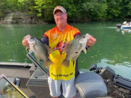 Corey Thomas says he uses planer boards to strategically intercept spooked fish moving away from the boat.