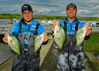 Dan Druschel (left) and Gus Glasgow (right) show off four large crappies from their First Place catch at a Pennsylvania tournament in late summer.
