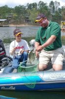 The Diamond Lakes—Catherine, Hamilton, Ouachita and DeGray—form a hub of outdoor recreational opportunities for Hot Springs, Arkansas visitors. Guests like father/son fishermen Dustin and Chris Elder can see tourist attractions in the national park and enjoy topnotch fishing for crappie nearby. (Photo: Keith Sutton)