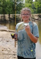 Khloe Moe is definitely a fan of minnow fishing, always a great option for youngsters who aren’t adept at “working a jig,” for crappie. (Photo: Tim Huffman)
