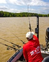 A good rod bend from a fish hooked by pulling jigs. Rod holder setup offers an efficient way to keep rods in place and easy to reach. (Photo: Tim Huffman)