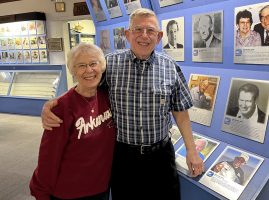 CrappieNOW’s senior writer Tim Huffman, and wife Jeanne, with Tim’s induction plaque (lower right corner) at the Freshwater Hall of Fame.