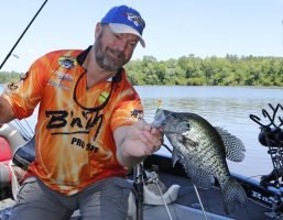 Steve Brown knows the importance of placing the jig into just the right spot. Jigging allows a fisherman to work a jig down into brush, fish shallow cover or drop down deep to underwater structure. (Photo: Tim Huffman)