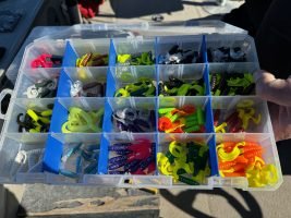 Toby Leavendusky’s secret weapons, an array of colorful plastic jigs he pours himself for his guide trips. (Photo: Brent Frazee)