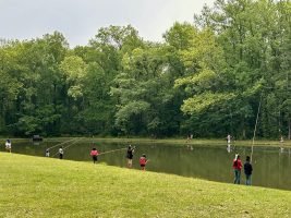 Children learning how to fish during a field trip at the Alabama Nature Center - a 350-acre haven for nature lovers, families, and curious minds. Operated by the Alabama Wildlife Federation, it’s designed to educate and inspire through immersive outdoor experiences. (Photo: Anietra Hamper)