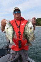 Guide Corey Thomas with two nice late summer crappie on Dale Hollow Lake.  