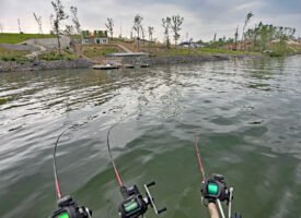 An area nears Moors Resort & Marina shows the tornado-damaged homes and property where rebuilding is still on-going. In the foreground is the rod setup for the front of the pontoon with a 14-, 10- and 7-foot rod system.
