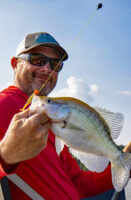 Brad Chappell uses fluorocarbon line. He likes the sinking line to get jigs down quicker and the low stretch for quickly getting a fish into the boat. (Photo: Tim Huffman) [Best Crappie Line]