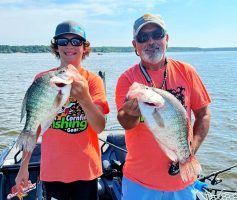 Mississippi crappie guide John Mayo (right) helped Lane Smith catch some dandy crappie along transition zones where the fish often stage in September. (Photo courtesy John Mayo)