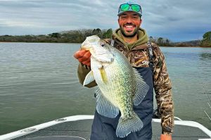 Anthony Mondo with a 4-pound crappie caught on Chickamauga Lake in February. Mondo said, “We just saw a mark on the screen that looked like a bass. I threw out there and I thought at first I had a 4-pound bass because it just started ripping line. I got it to the side of the boat and my buddy freaks out. He’s like, ‘Dude, that’s a giant crappie!” (Photo courtesy Anthony Mondo)