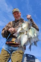Chattanooga crappie angler Ross Malone knows he’s got his work cut out for him when he gets home, preparing a big stringer of crappie for the frying pan or the freezer. In East Tennessee the crappie creel limit is 15 per person per day with a minimum 10-inch size limit. (Photo: Richard Simms)